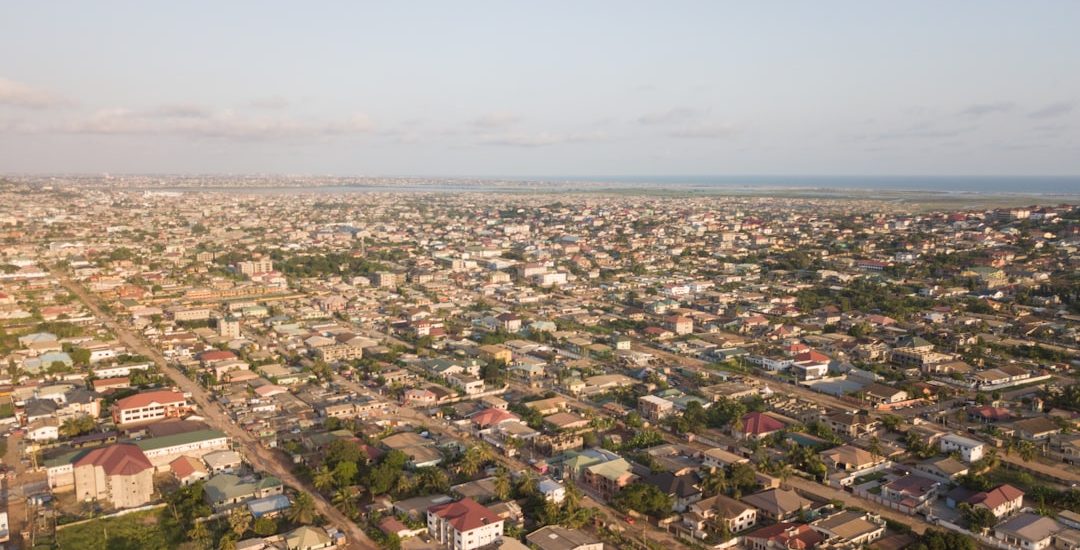an aerial view of a city with lots of houses
